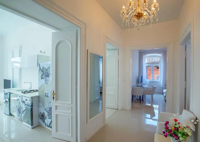 Collins Center Апартаменты *